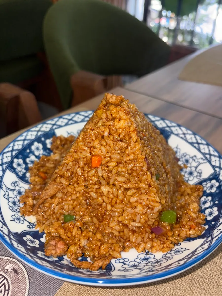 Fried rice served in a blue-and-white bowl