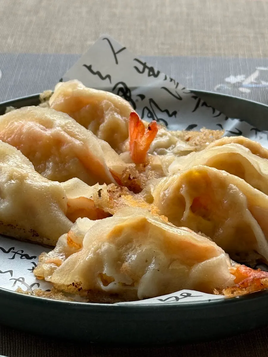Close-up of freshly pan-fried pot stickers with prawns at Fengyage